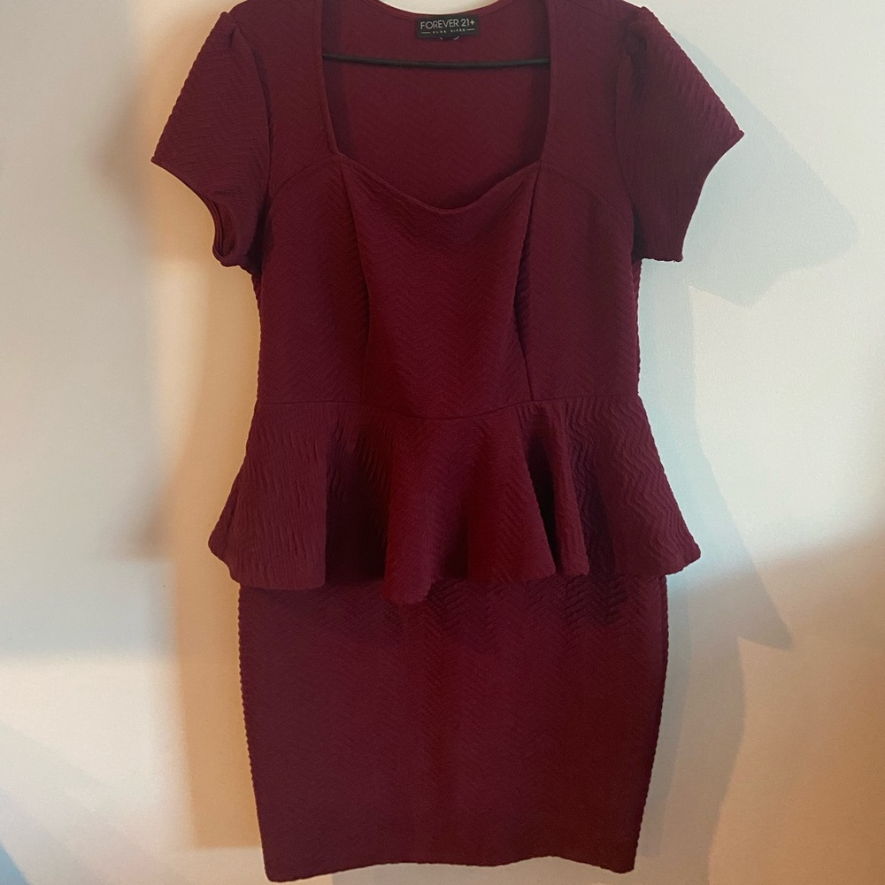 Plus sized burgundy peplum mini dress